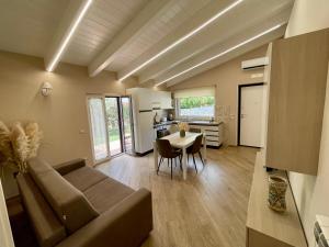 a living room with a couch and a table at Connie's Home in Agerola