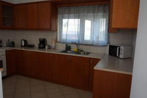 Kuchyň nebo kuchyňský kout v ubytování Yapyli Home
