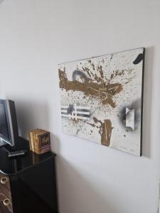 TV a/nebo společenská místnost v ubytování Apartman Galerija