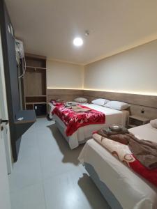 Katil atau katil-katil dalam bilik di Hotel Mafra