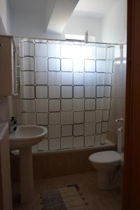 Koupelna v ubytování Yapyli Home