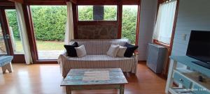 O zonă de relaxare la Hedwig - cabaña con vista a los cerros