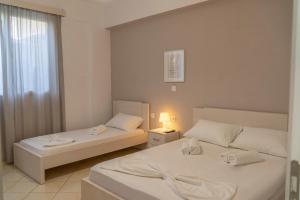 Postel nebo postele na pokoji v ubytování Koks’ Guesthouse