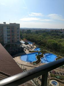 a view of a resort with several swimming pools at Alta Vista Thermas Resort in Caldas Novas