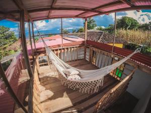 an overhead view of a hammock on a balcony at Tierra Activa Alojamiento Eco Rural finca orgánica y agroturística in San Agustín