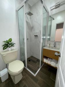 Koupelna v ubytování Hotel Mado