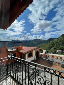 a view from the balcony of a house at Hotel & Balneario Los Angeles in Taxco de Alarcón