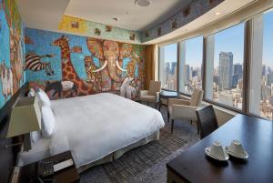 Postel nebo postele na pokoji v ubytování Park Hotel Tokyo