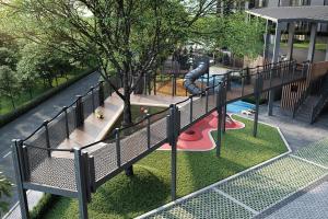 an aerial view of a playground with a slide at Humaira Dian Residency Studio Homestay 360sqft in Shah Alam