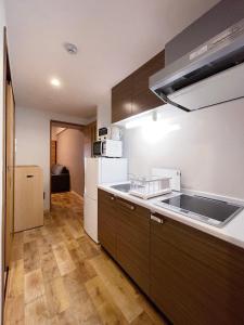 Kuchyň nebo kuchyňský kout v ubytování Casaen - Apt 1BR for 6 ppl good location