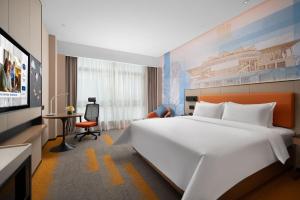 Postel nebo postele na pokoji v ubytování 南宁兴宁希尔顿欢朋酒店 Hampton by Hilton Nanning Xingning + 37 fotografií