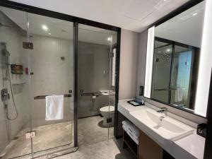 Koupelna v ubytování 南宁兴宁希尔顿欢朋酒店 Hampton by Hilton Nanning Xingning