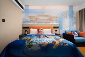 Postel nebo postele na pokoji v ubytování 南宁兴宁希尔顿欢朋酒店 Hampton by Hilton Nanning Xingning