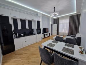 Η κουζίνα ή μικρή κουζίνα στο Green City Residence