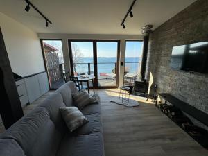 TV/trung tâm giải trí tại Apartamenty Fuleda nad jeziorem Dobskim Mazury Holiday