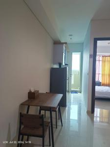 TV/trung tâm giải trí tại 1BR new apartment at Borneo Bay City Balikpapan +11 ảnh