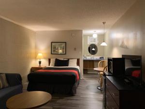 Postel nebo postele na pokoji v ubytování Motel Bavaria