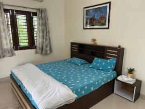Postel nebo postele na pokoji v ubytování Samadhan Home Stay