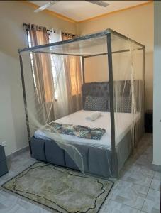 Postel nebo postele na pokoji v ubytování Al Maaroof Appartment