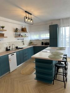 Kuchyň nebo kuchyňský kout v ubytování Daisy Apartment 27