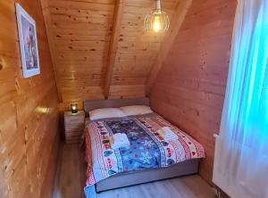 Posteľ alebo postele v izbe v ubytovaní Apartments Plitvice forest