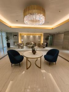 Χώρος καθιστικού στο Casa Fama - Fame Residences Staycation