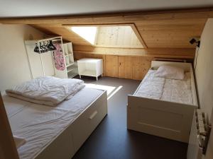 Una cama o camas en una habitación de Les biches du Soula 5 couchages proche piste ski