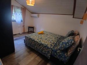 Postel nebo postele na pokoji v ubytování Chez Reine et Yves
