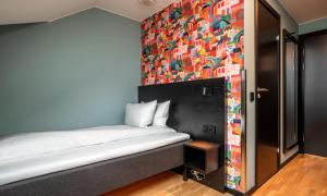 Postel nebo postele na pokoji v ubytování Thon Hotel Hammerfest