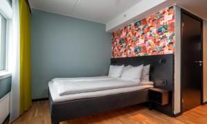 Postel nebo postele na pokoji v ubytování Thon Hotel Hammerfest