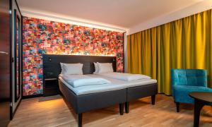 Postel nebo postele na pokoji v ubytování Thon Hotel Hammerfest