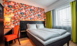 Postel nebo postele na pokoji v ubytování Thon Hotel Hammerfest
