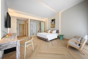 Postel nebo postele na pokoji v ubytování Centara Life Lamai Resort Samui + 34 fotografií