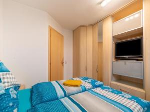 Postel nebo postele na pokoji v ubytování Apartment Neukirchen near Ski Slopes