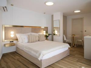 Кровать или кровати в номере Golden Luxury Suites