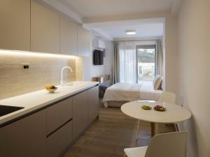 Кровать или кровати в номере Golden Luxury Suites