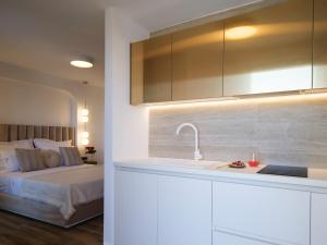 Кровать или кровати в номере Golden Luxury Suites