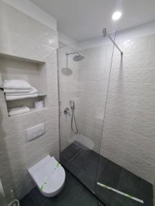 Koupelna v ubytování Hotel Comandor