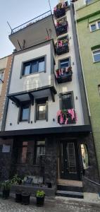 a building with flower boxes on the side of it at BOLCELLO HOTEl in Istanbul
