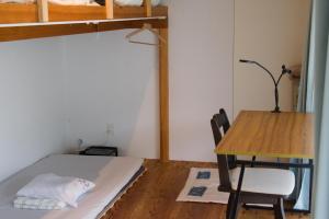 Postel nebo postele na pokoji v ubytování Guesthouse Muga
