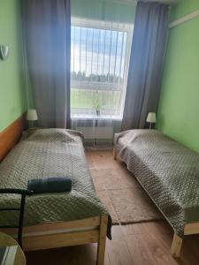Postel nebo postele na pokoji v ubytování Transhostel FAMILY