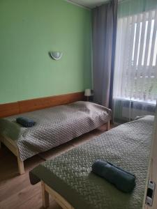 Postel nebo postele na pokoji v ubytování Transhostel FAMILY