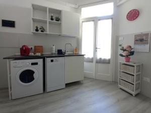 Kuchyň nebo kuchyňský kout v ubytování La Casa di Gastone + 8 fotografií