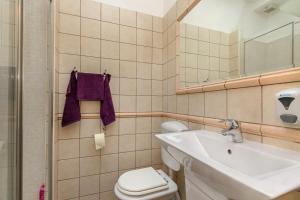 Kúpeľňa v ubytovaní Apartments Aspalathos
