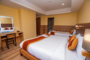 Una cama o camas en una habitación de Hotel Hidden Kingdom