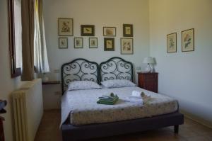 Postel nebo postele na pokoji v ubytování Agriturismo Picchio Rosso
