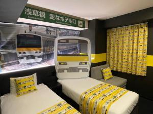 Postel nebo postele na pokoji v ubytování Henn na Hotel Tokyo Asakusabashi