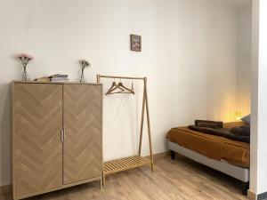 Postel nebo postele na pokoji v ubytování Le Saint-Georges, BNBConciergerie