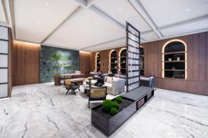 Istumisnurk majutusasutuses Atour Hotel Zhengzhou North Dragon Lake Financial Center