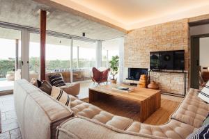 A seating area at Villa Tramuntana Luxury Sea View Retreat - Cap d'en Font, Menorca